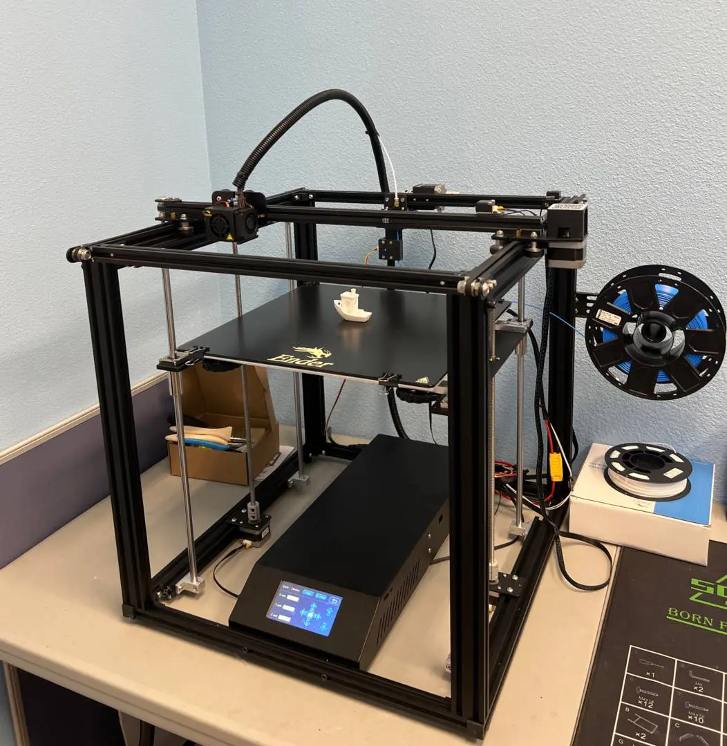 Fused-filament 3D printer producing a small prototype